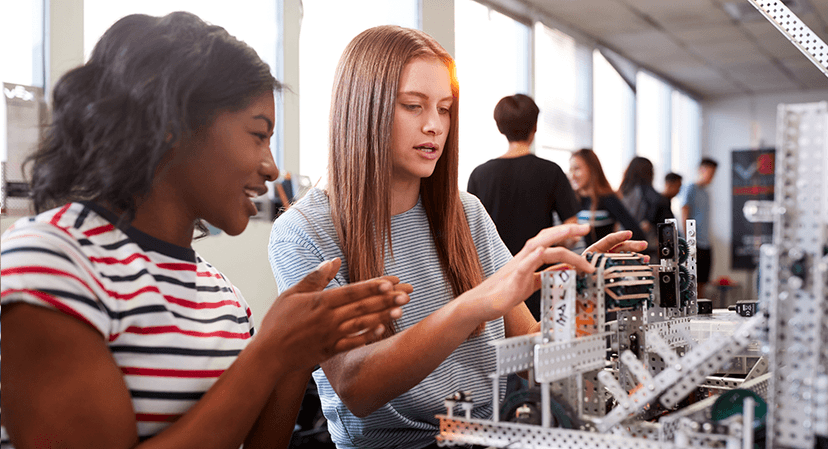 two female engineering students in a lab